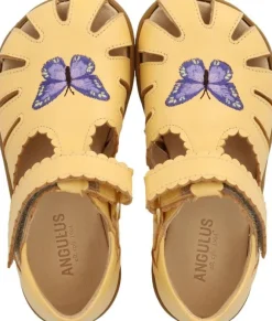 Sandal med lukket tå og sommerfugl
